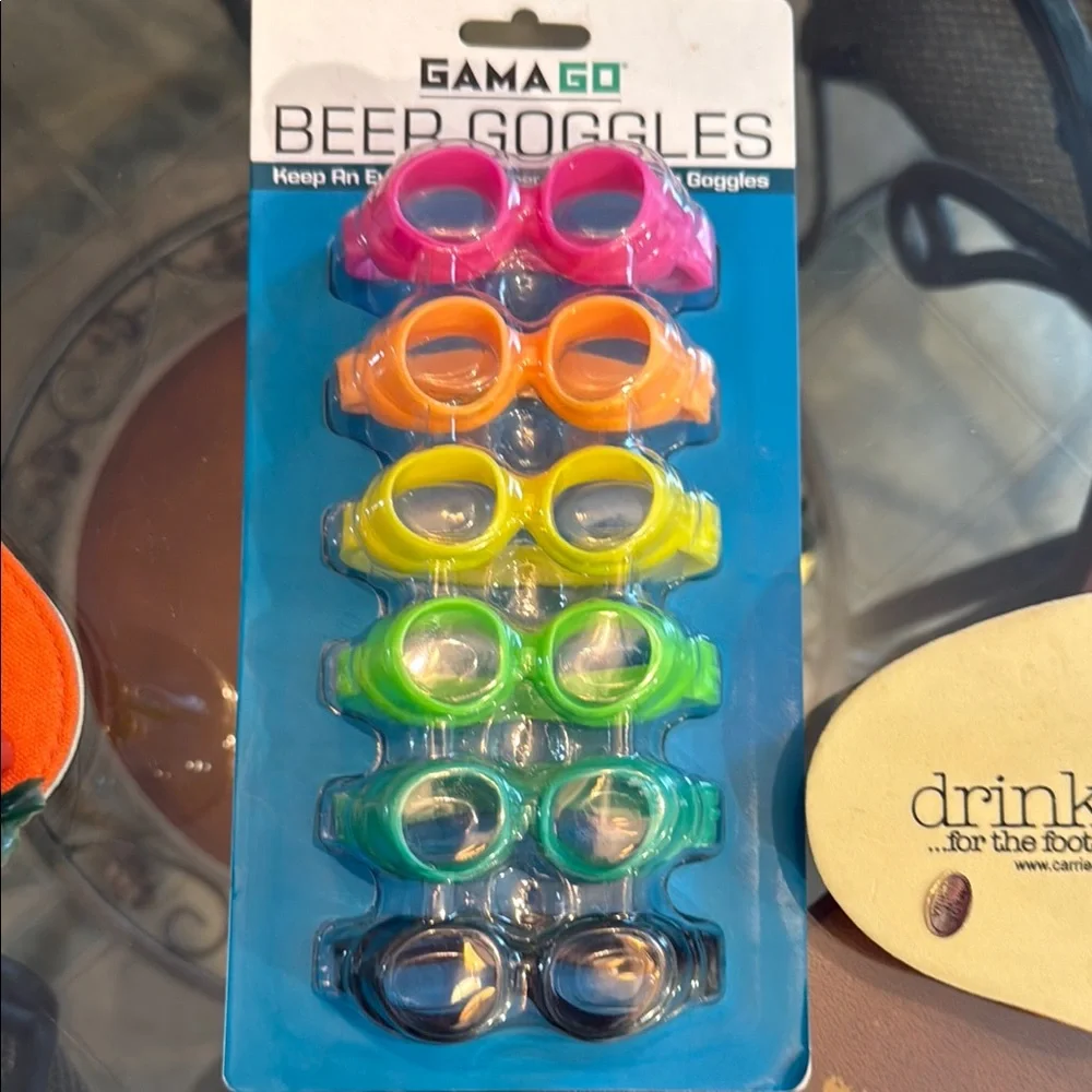 Gama Go Beer Goggles Set with wine glass footwear and lily pad wine stopper.